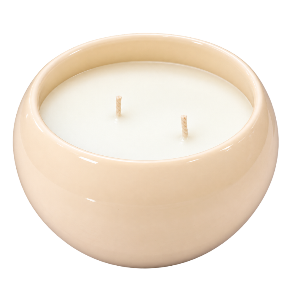 Peach-colored dome-shaped candle in an elegant decorative jar, featuring premium wax and a soft pastel finish for home décor and gifting.